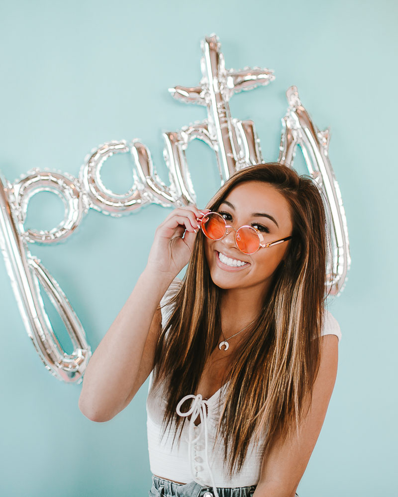 pretty girl wearing orange sunglasses