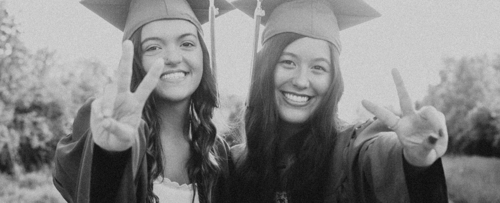 high school graduation with senior girls and their hats