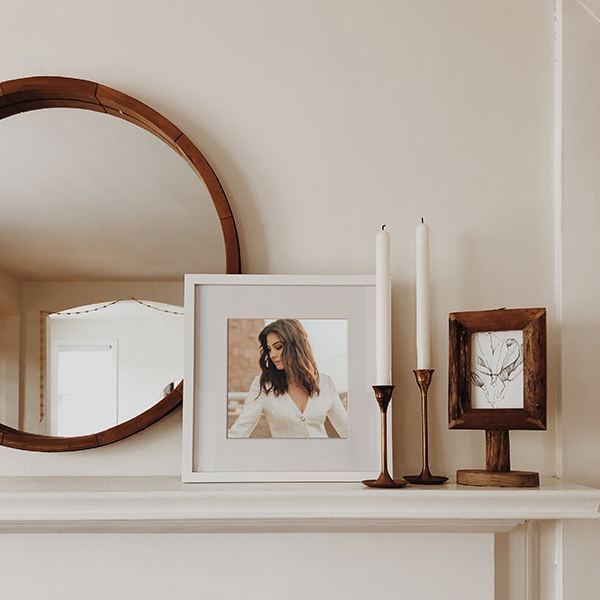 framed picture on mantle